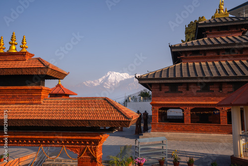 Morning time inside temple in Sarangkot hill area with magical view to Annapurna range in Nepal.