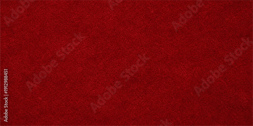 Vintage dark red paper and fabric material textures featuring a rough grunge surface design ideal for a blank Christmas cloth backdrop or old textile wallpaper background