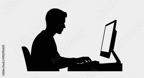 Man Working on Computer Silhouette Profile.