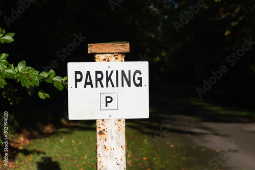 Sign at a park advising motorists that they can park in this area.