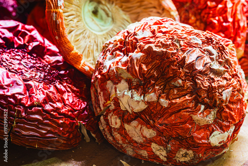 Dehydrated red and white spotted fly agaric (amanita muscaria) mushrooms toadstools dried to preserve them for long term storage.