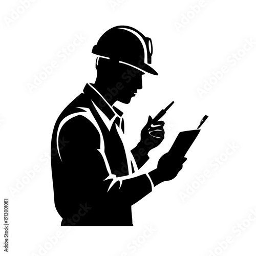 Construction worker in hard hat using tablet and stylus