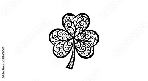 A black and white illustration of a four-leaf clover with intricate designs.