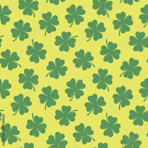 Seamless lucky clover pattern in green, white, yellow, and dark emerald hues