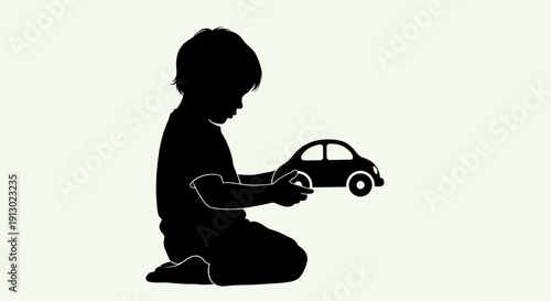 Child Playing with Toy Car Silhouette.