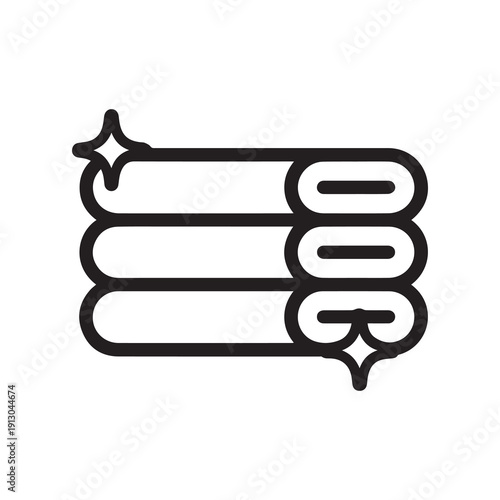 Stacked towels with decorative sparkles on minimalistic background