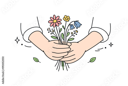 Hands holding spring flowers. Hands rest loosely in front of the body holding wildflowers, stems uneven and relaxed. Casual moment of