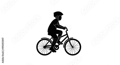 Young Boy Riding Bicycle Silhouette Profile.