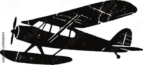 Silhouette of a single engine floatplane with high wings and propeller, side view