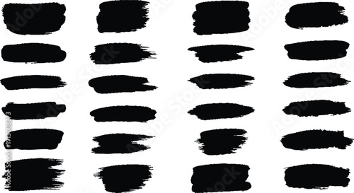 Collection of twenty black ink brush strokes and splatters on white background