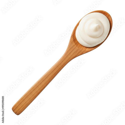 Wooden spoon with swirling mayonnaise