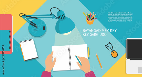 Top view of hands drawing in a notebook on a creative desk, illuminated by a lamp, surrounded by a laptop, pencils, and art supplies.