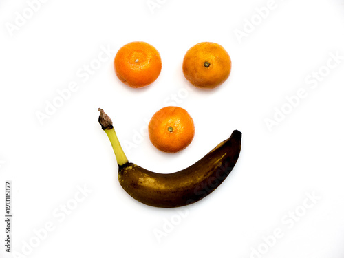 Obraz na płótnie Mandarins and Banana. Smile.