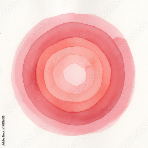 Watercolor painting of concentric circles in pink and red hues. Abstract art with gradient effect for graphic design element. Creative handmade texture.