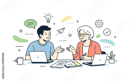 Intergenerational teamwork. Younger and older colleagues working together at a table with laptops and documents, calm collaboration and