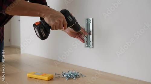 Professional Handyman Installing Wall Mount Bracket with Cordless Drill & Screws | Home Improvement DIY