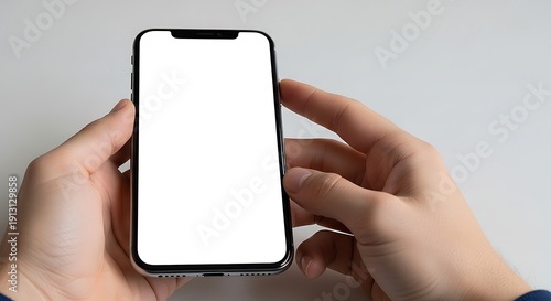 Wallpaper Mural Hands holding a modern smartphone with a blank white screen. Torontodigital.ca
