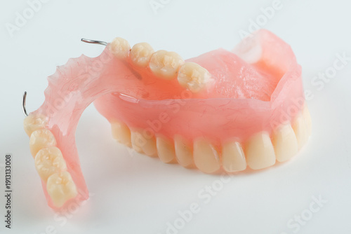 Removable plastic dentures for dental restoration