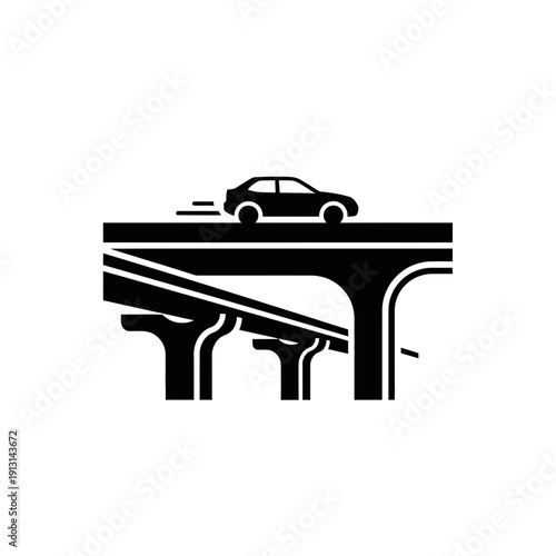 Car driving on a multilevel highway overpass.