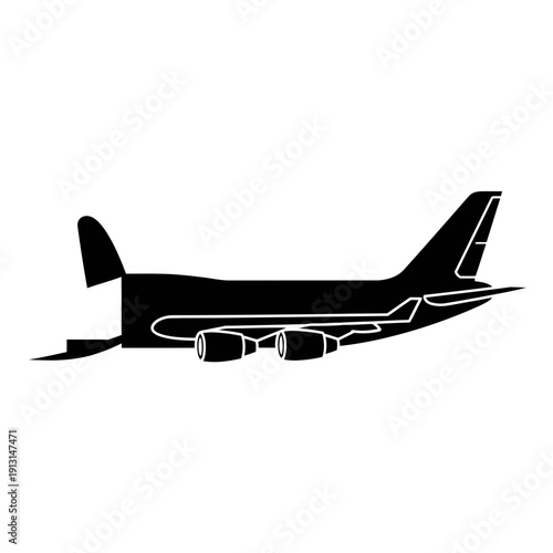 Silhouette of a large cargo airplane in flight.