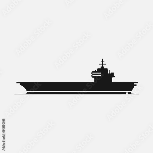 Silhouette of a modern aircraft carrier warship.