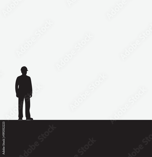 Construction worker silhouette in hard hat standing on dark line