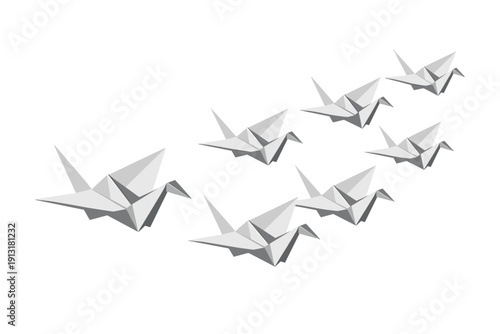 Origami paper cranes flying in formation, symbol of peace