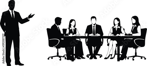 Professional business leader presenting corporate strategy to diverse office team sitting at conference table during executive meeting in modern office workspace silhouette.