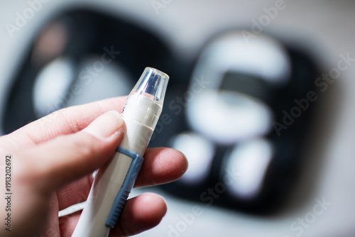Foto Person preparing allergy medicine