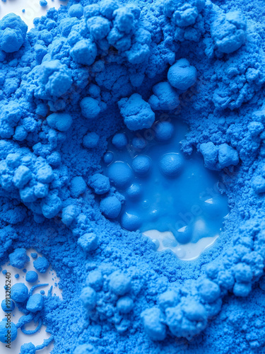 Close up of Blue Copper Peptides in Powder and Liquid Form