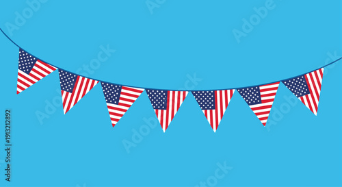 String of triangular american flag bunting hanging against a clear blue sky background for patriotic celebrations and holidays.