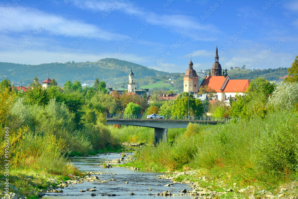 Fototapeta premium Early autumn Nowy Sacz above Kamienica river in the sunny day, Lesser Poland.