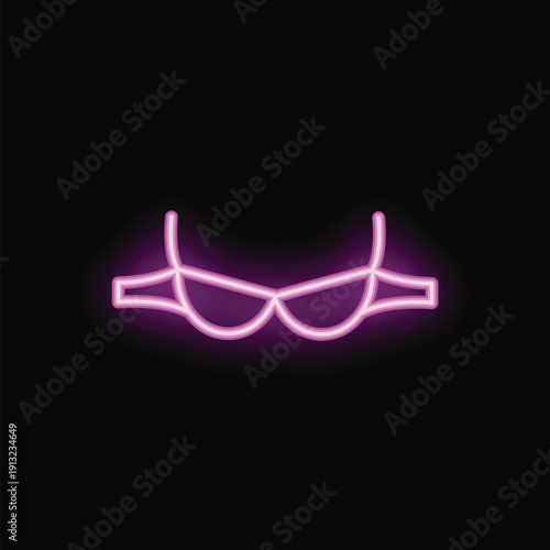 Neon pink bra sign is glowing on a black background