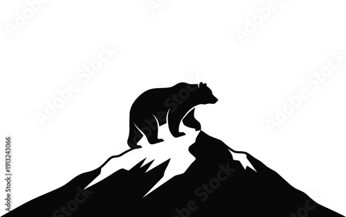 Silhouette of a bear on a mountain peak at sunset silhouette