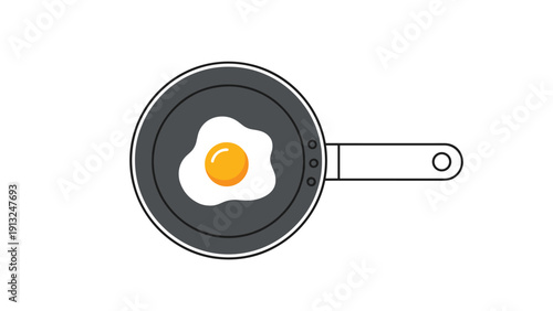 Single sunny-side up fried egg cooking in a black frying pan viewed from above for breakfast or cooking themes.