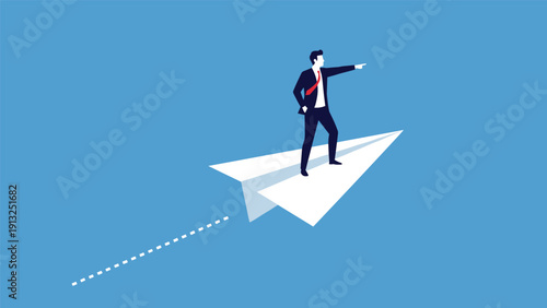 Confident businessman in a suit flies through a blue sky on a large paper airplane while pointing forward toward a successful future.