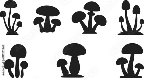 Mushroom silhouette collection featuring various toadstool fungi shapes in black vector style isolated on white background