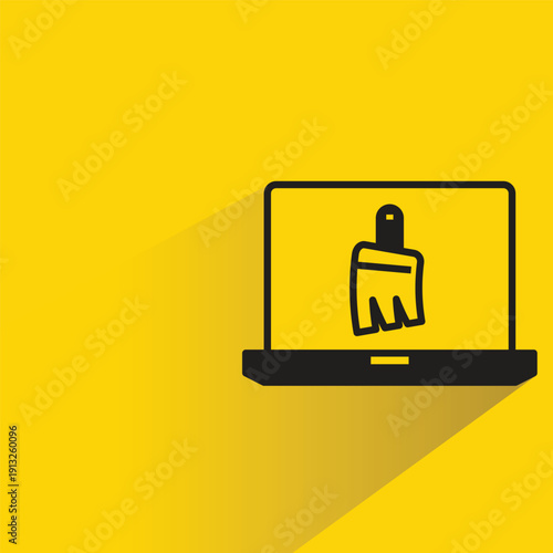 laptop cleanup icon on yellow background