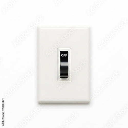Light switch in off position mounted on plain white wall background