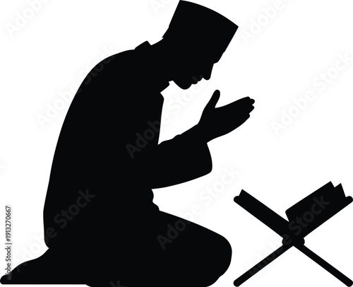 Muslim Man Praying With Quran On A Stand Silhouette
