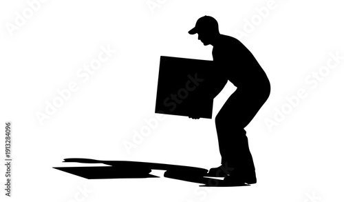 Strong Silhouette: A worker skillfully lifts a heavy box, showcasing the strength and precision needed for the task, conveying a sense of industry and diligence.