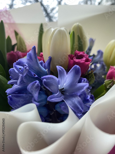 Close-up of Beautiful Bouquet with Hyacinths, Tulips, and Roses, Perfect for Celebrations and Special Occasions, Indoors