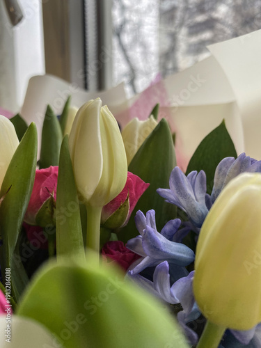Close-up of Spring Flower Bouquet with Tulips, Hyacinths, and Roses, Celebrating Beauty of Nature and Floral Arrangement