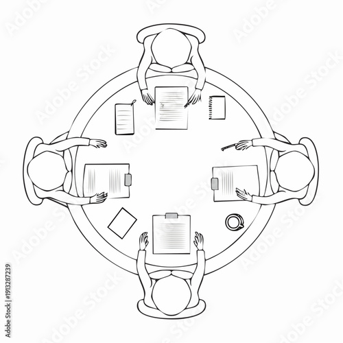 Business meeting with four people around a circular table.
