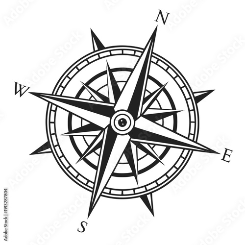 A black and white image of a compass with a star in the middle