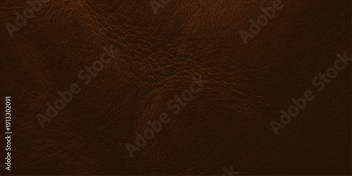 A dark vintage brown leather material texture with a natural rough grunge surface pattern for a textured wallpaper background design