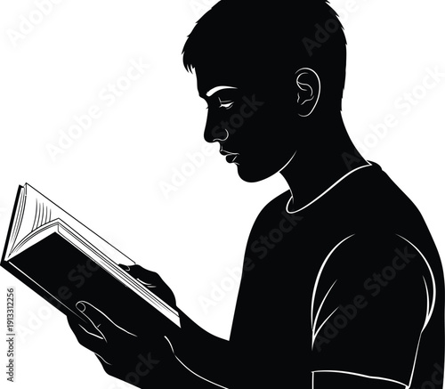 Young male student deeply engrossed in reading a book with focused attention and interest
