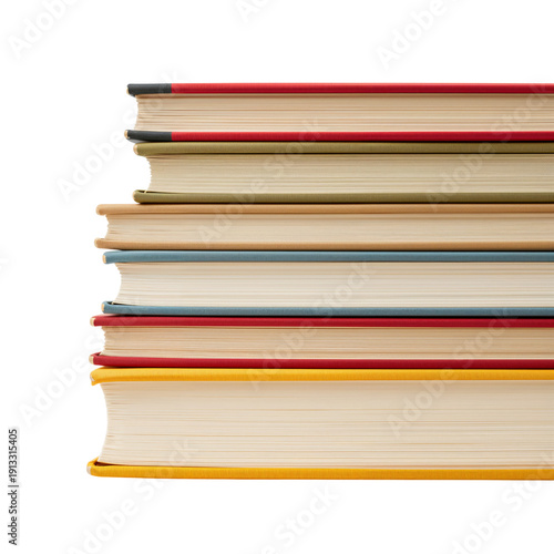Stacked Books on a Table With Colorful Spines at a Reading Corner in a Library