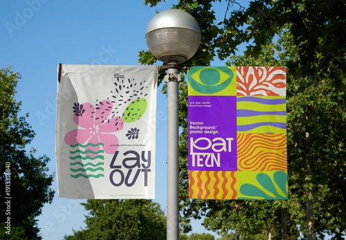 Real photo of two Blank Banners on a Street Lamp Stand in Barcelona. PSD mockup for your logo design.