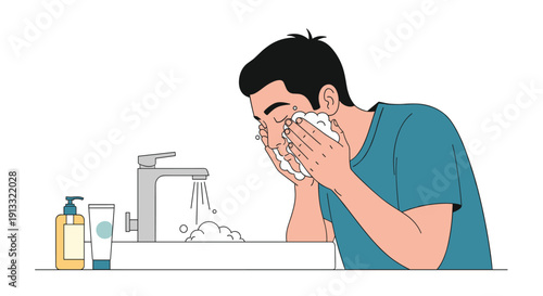 Young man washing his face with cleanser foam over a sink with running water in a bathroom, part of a daily skincare routine.